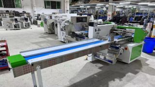 Macchina Flow Pack per gallette di riso e spiedini